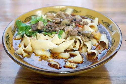 瓜家人吃刀削面,舌尖上的传统美味之旅